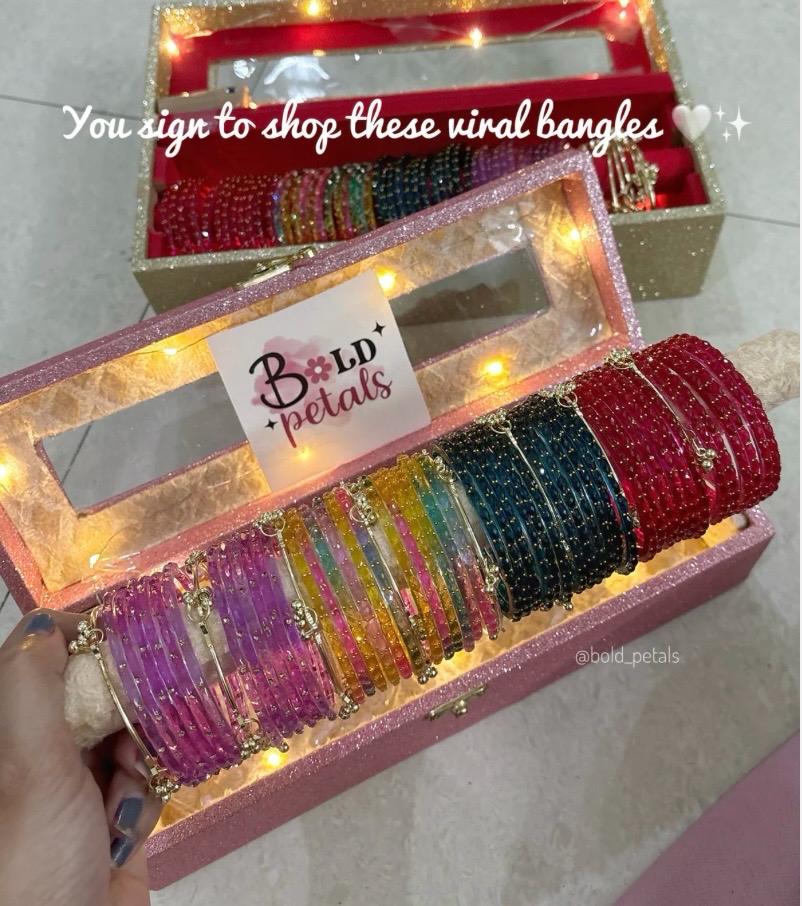 4 Sets Of Bangles